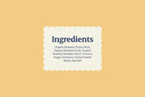 Ingredient label for Sip Herbals Cinnamon Roll blend listing roasted chicory, dandelion root, carob, and vanilla beans
